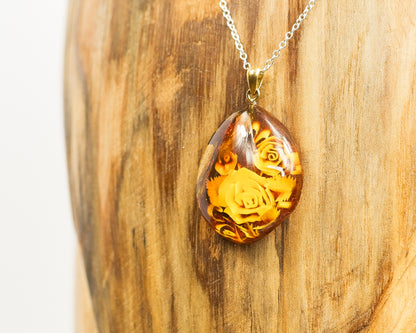 Baltic Amber Pendant With Floral Engraving