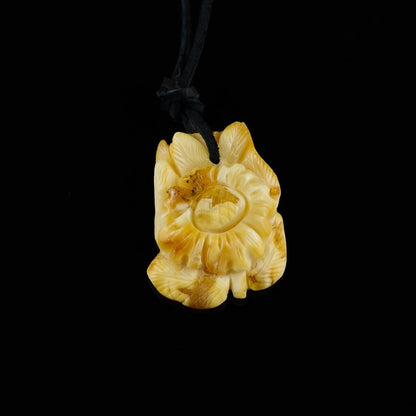 Amber amulet camomile