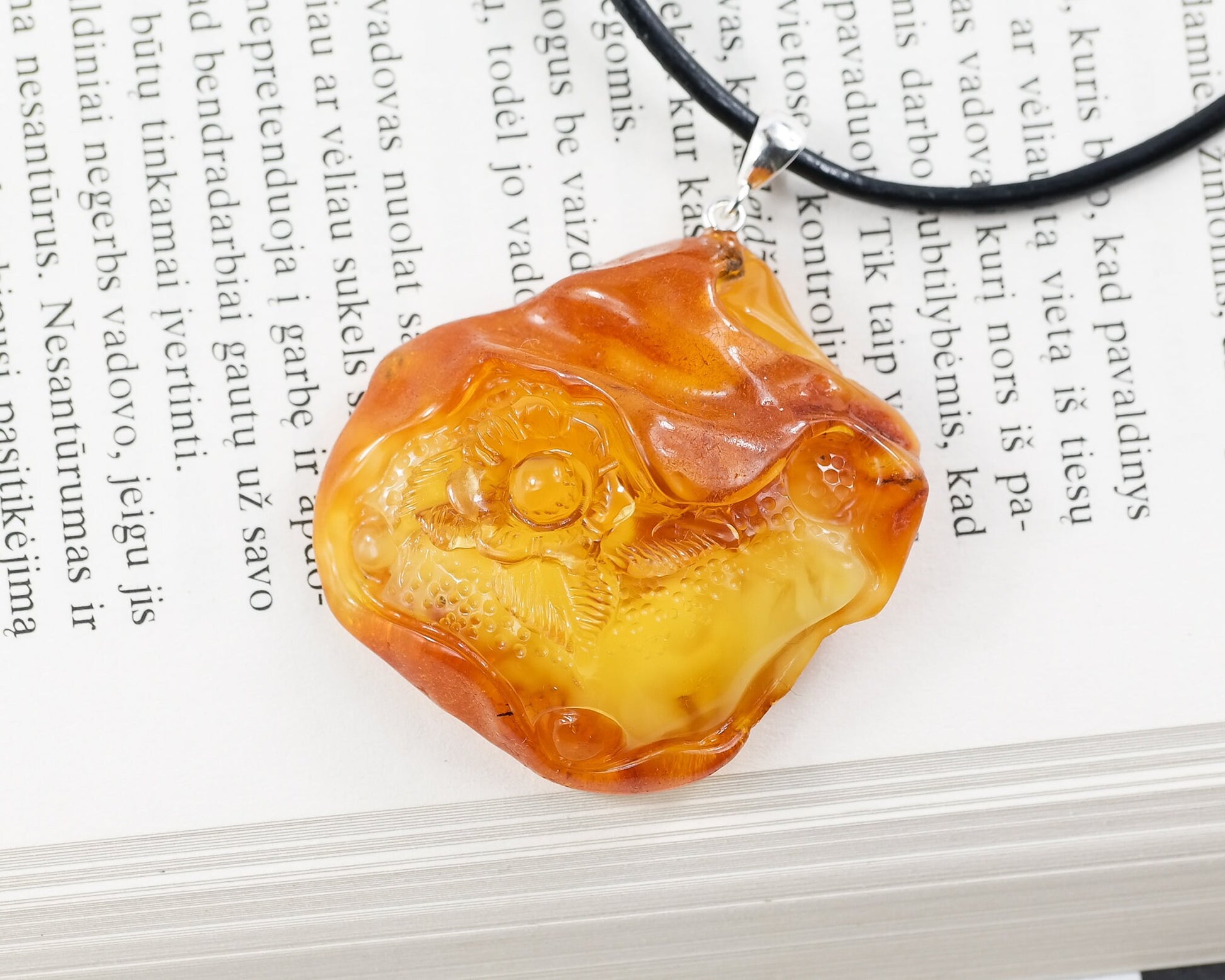 Floral amber amulet